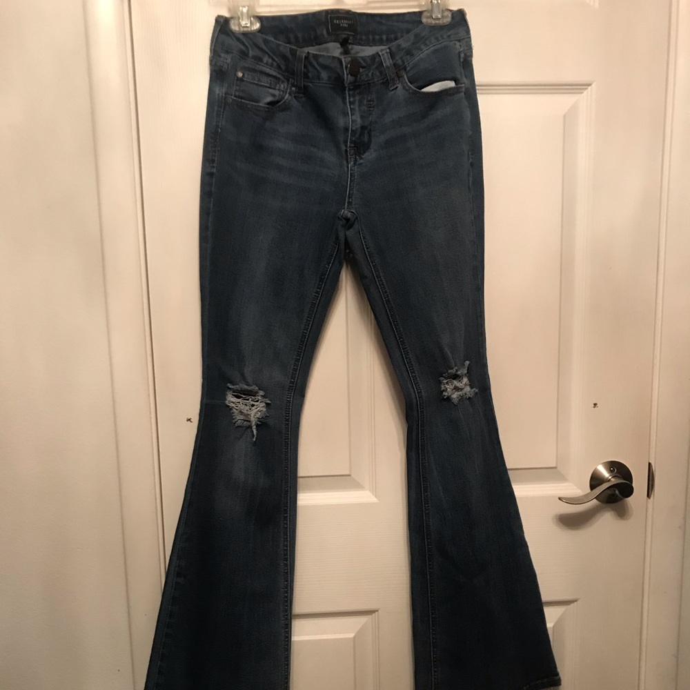 Distressed at knees jeans. Celebrity Pink